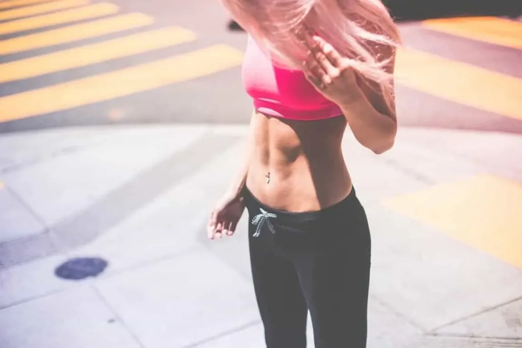Woman with toned stomach after LA-EMS Body Sculpting Treatment Bristol